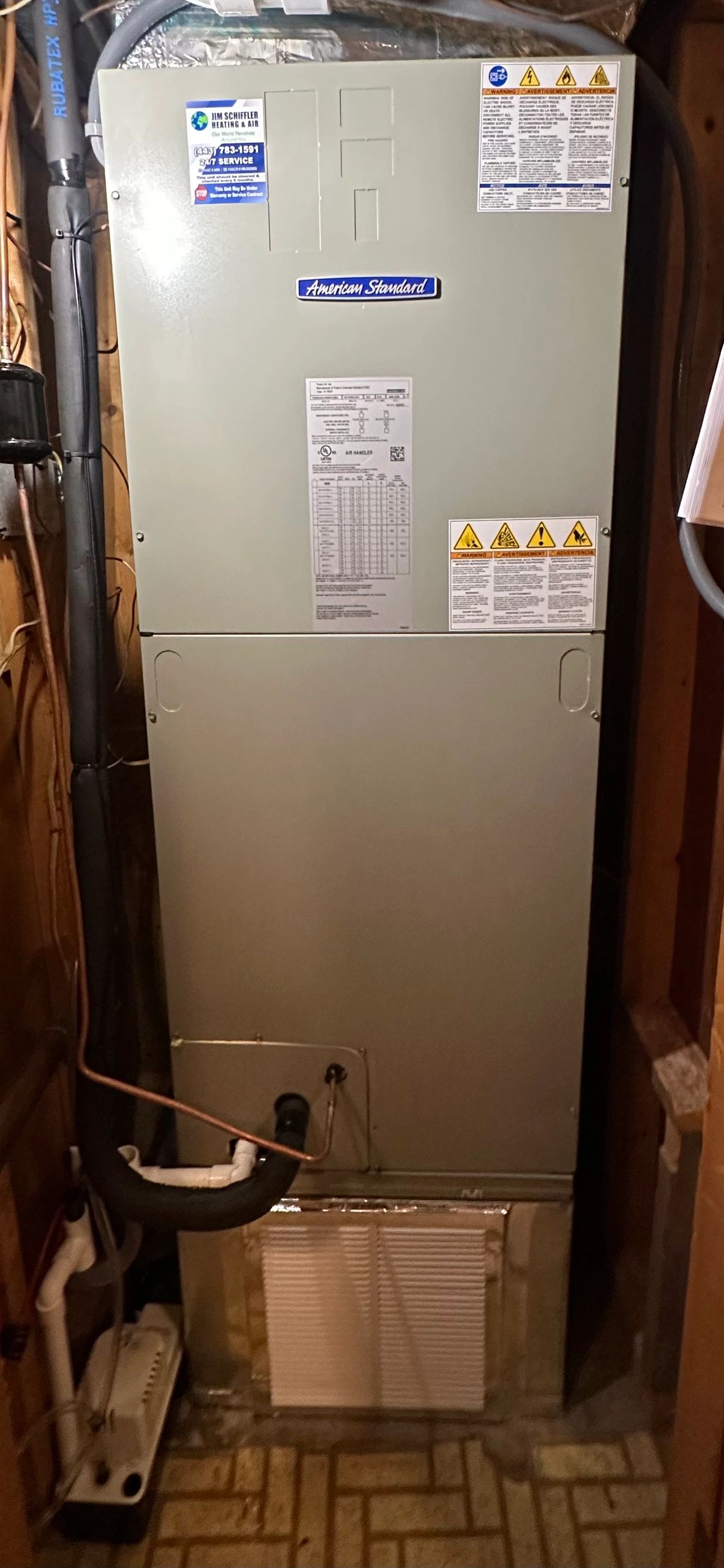 American Standard air handler with insulated refrigerant lines in a closet installation